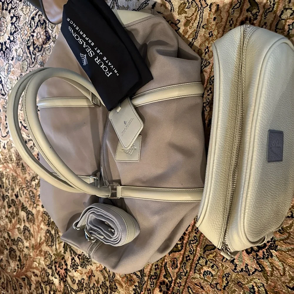 Exclusive Four seasons private jet experience duffel and toiletry kit.  BNWT
